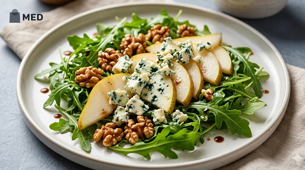Salad topped with blue cheese, pears, and walnuts.