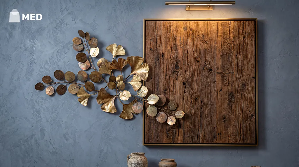 Wooden wall panel with metallic leaf decor adding texture and dimension.